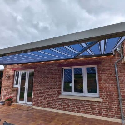 store banne Lumisol Winsol motorisé installé sur terrasse par SARL AUBURSIN
