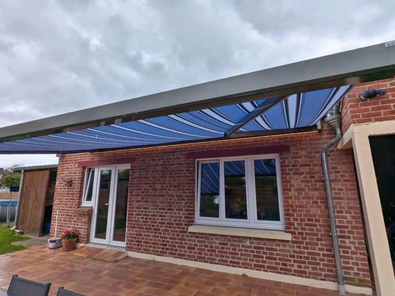 store banne Lumisol Winsol motorisé installé sur terrasse par SARL AUBURSIN